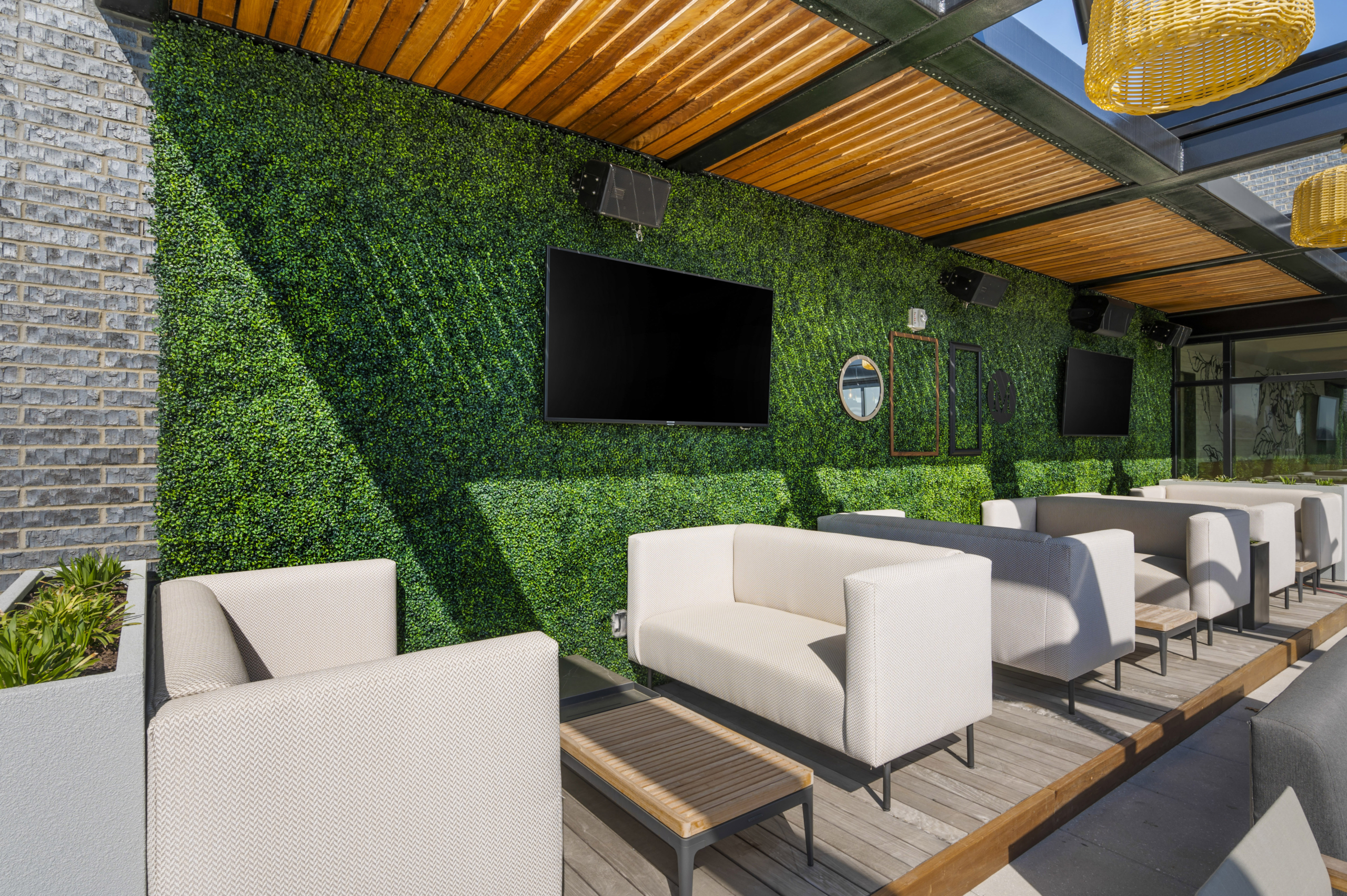 rooftop lounge with TVs